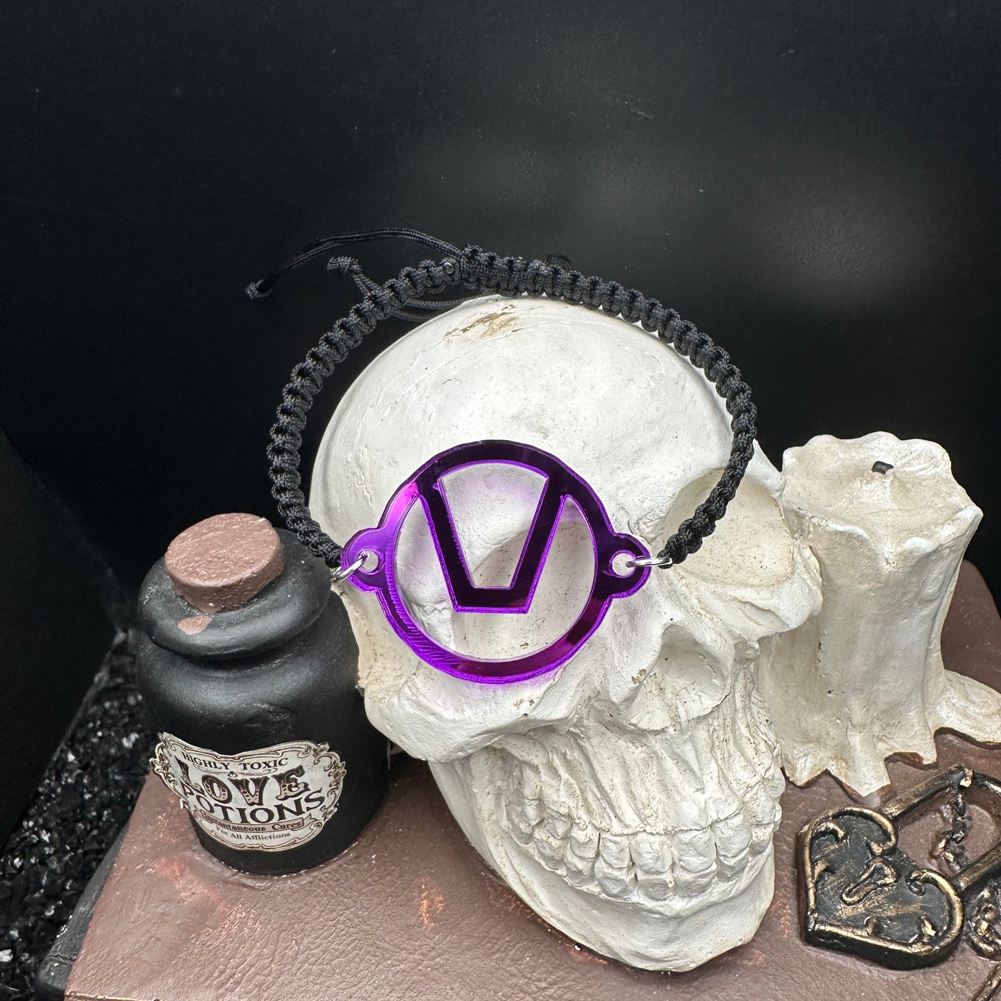 Swinger Symbol Purple Acrylic Bracelet on Adjustable Black Cord