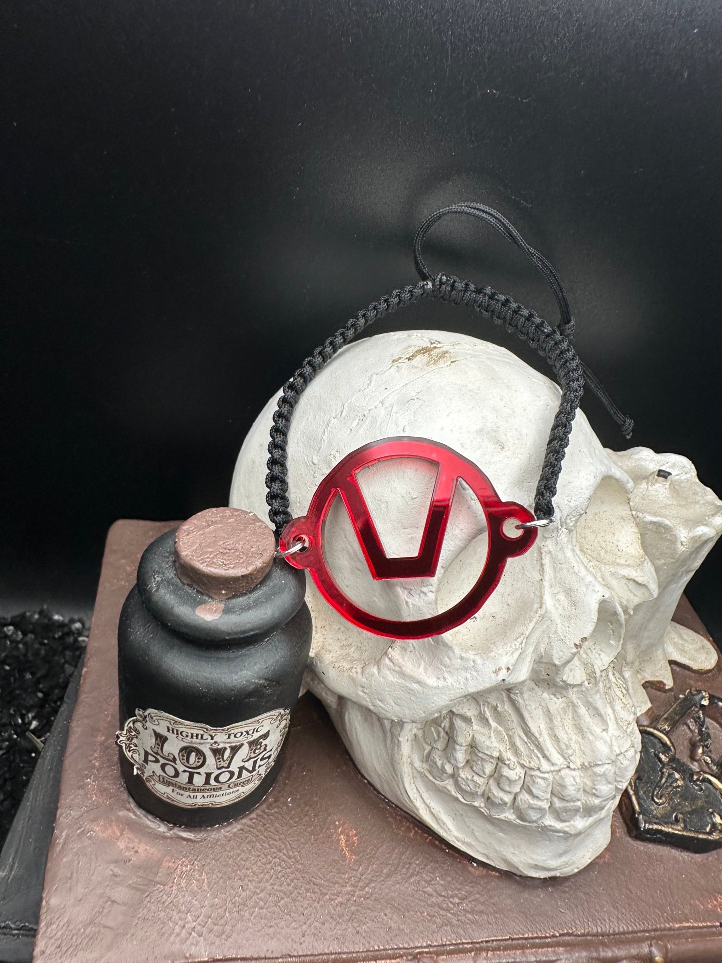 Swinger Symbol Lime Red Acrylic Bracelet on Adjustable Black Cord