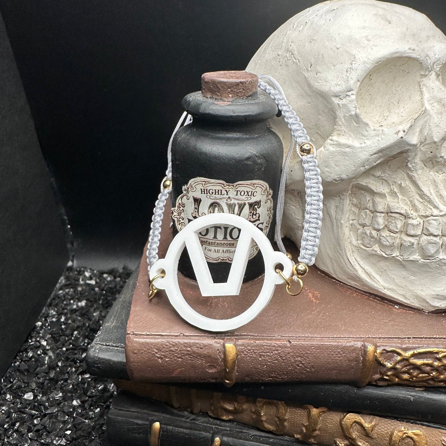 Swinger Symbol White Acrylic Bracelet on Adjustable Grey Cord