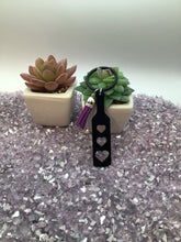 Load image into Gallery viewer, BDSM Heart Paddle Keyring, Black Acrylic w/Purple Tassel
