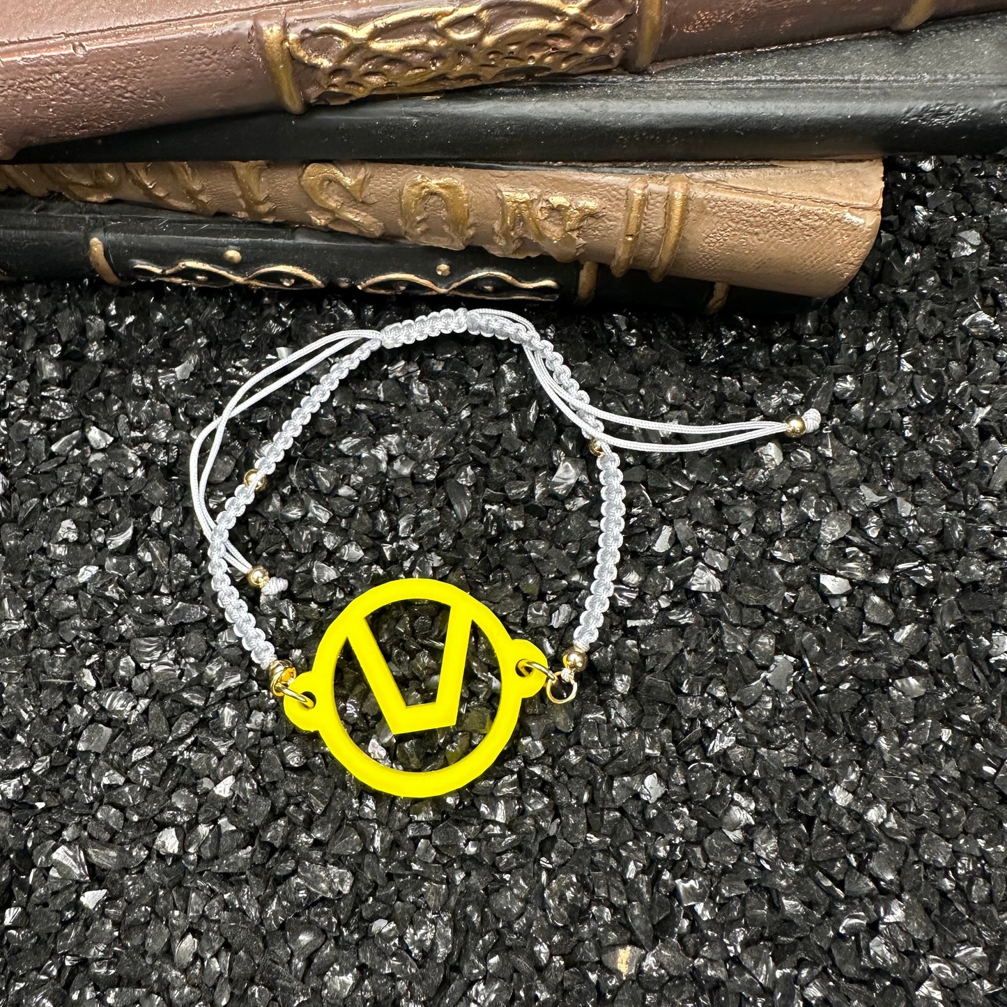 Swinger Symbol Yellow Acrylic Bracelet on Adjustable Grey Cord