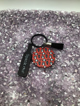 Load image into Gallery viewer, BDSM Kink Gag Round Keyring w/ Spank Me Paddle in Black Acrylic w/Black Tassel
